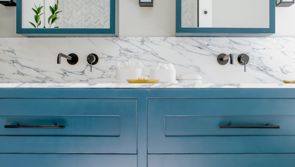 Custom blue bathroom vanity by Portugal Woodworks in Park City and Heber, Utah.